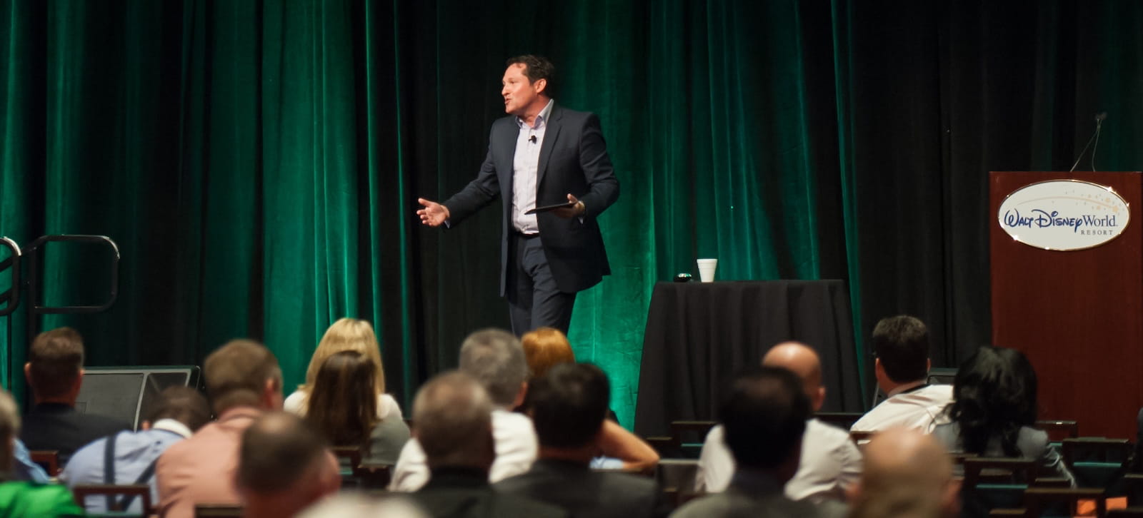 Stephen Shapiro speaking on stage at Walt Disney World Resort