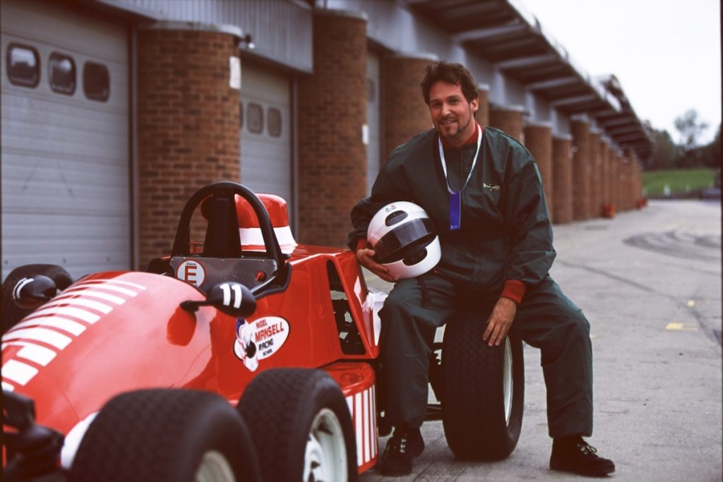 Stephen Shapiro getting ready to drive a race car